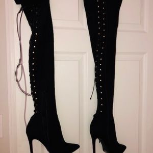 Thigh high lace up boots